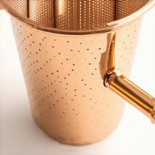 Close-up of copper espresso basket showing micro-perforations.